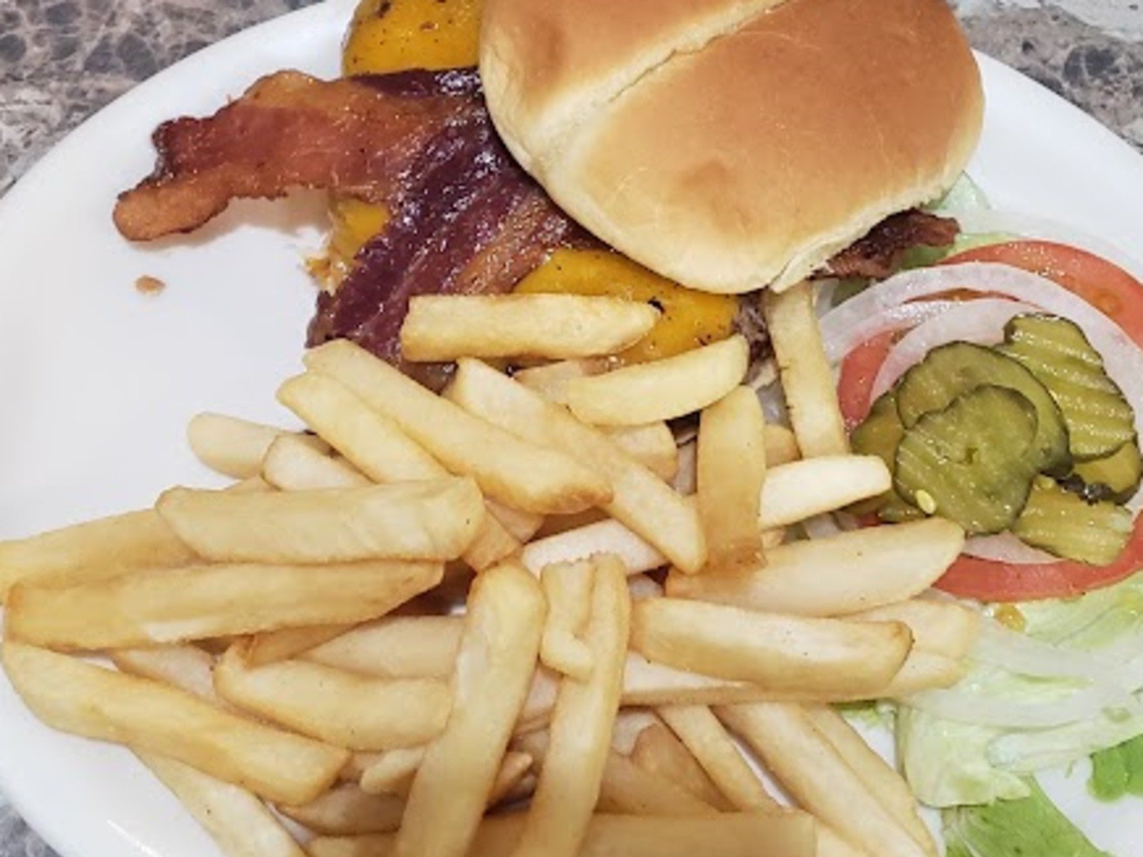 Pullman Place Family Restaurant was our choice for pregame. The MoPac burger got a 7.8/10 rating in our Burgers Before Baseball series.